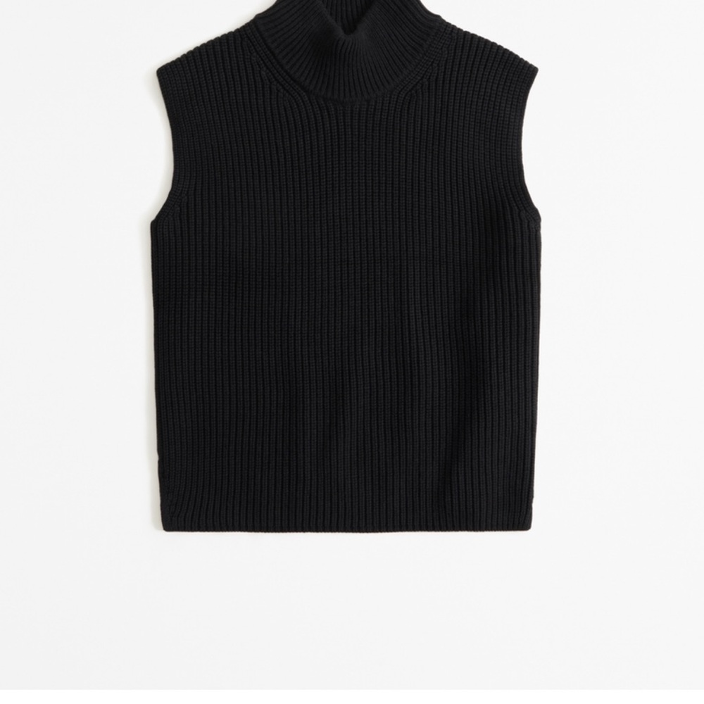 Black sleeveless turtleneck